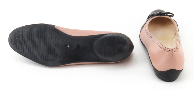 Salvatore Ferragamo pink leather spectator flats with black patent leather trim, brogueing and rubber soles