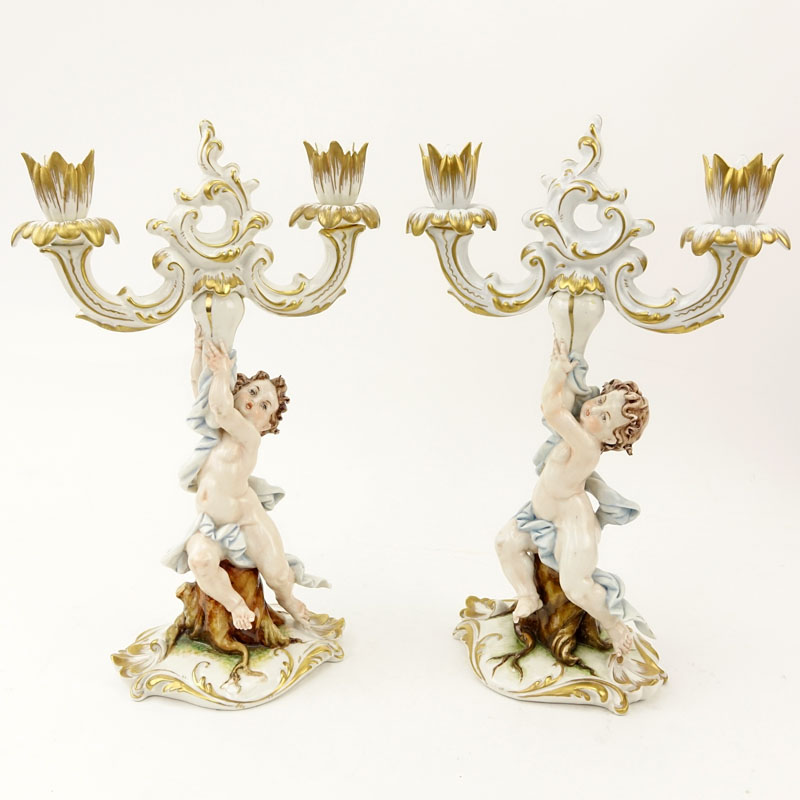 Pair of Capodimonte Putti Figural Porcelain Candlesticks