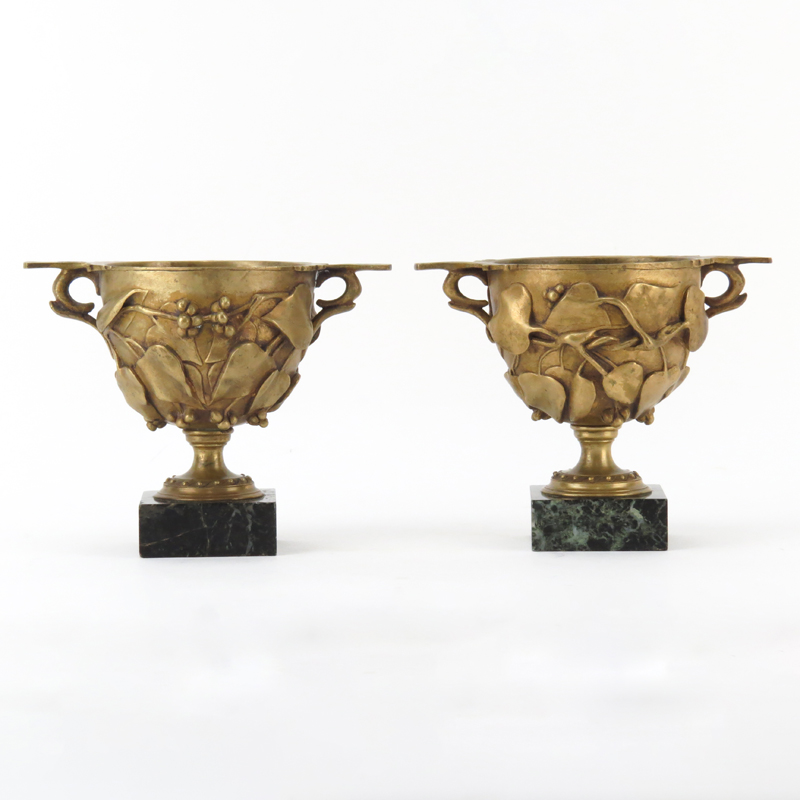 Pair of French Early 20th Bronze Urns on Marble Base