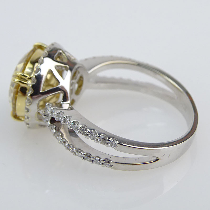 4.04 Carat Oval Brilliant Cut Fancy Brownish Yellow Diamond and 18 Karat White Gold Engagement Ring.