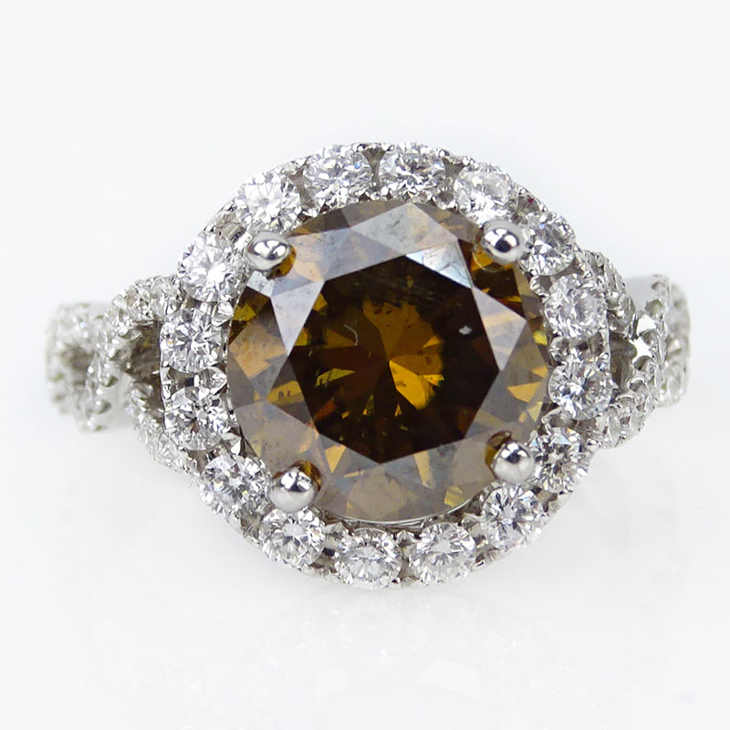 3.23 Carat Round Brilliant Cut Fancy Intense Brown Orangey Yellow Diamond and 18 Karat White Gold Engagement Ring