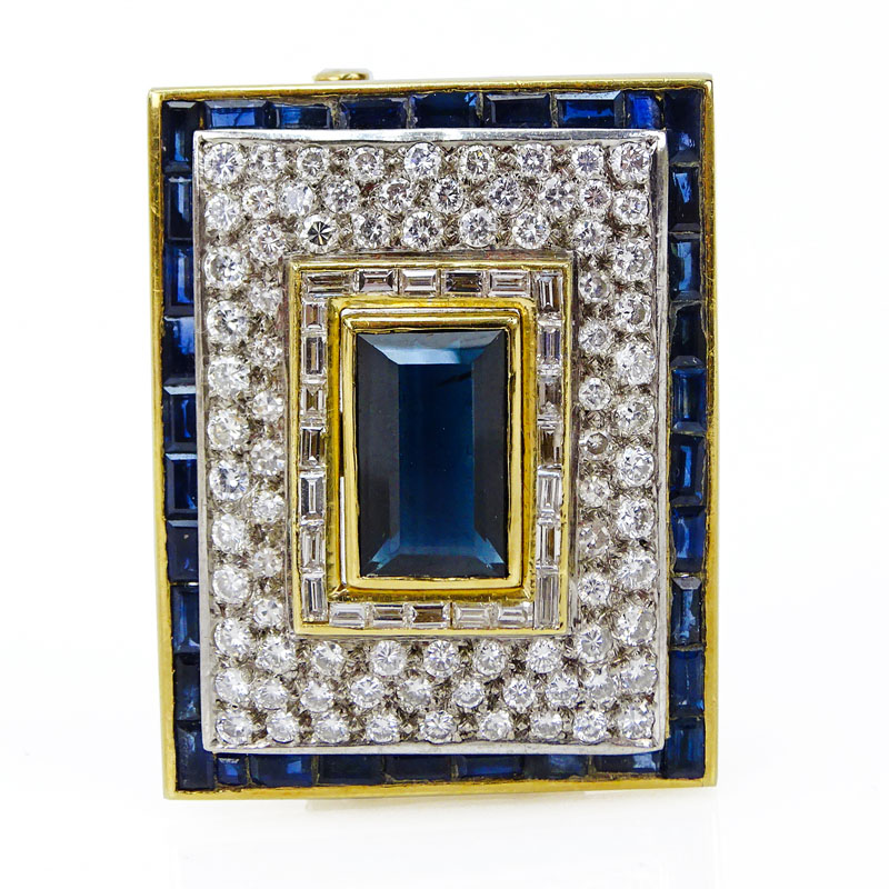 Sapphire, Diamond and 18 Karat Yellow Gold Brooch set in the Center with an Emerald Cut Sapphire Measuring 13
