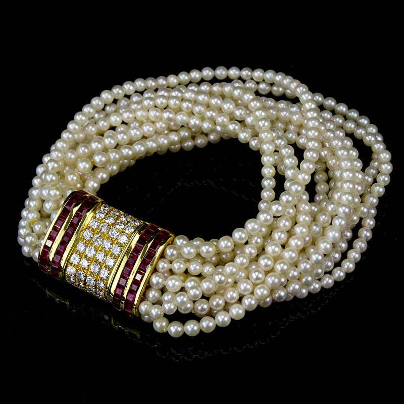 Beautiful Quality Square Cut Burma Ruby, Round Brilliant Cut Diamond, Multi Strand Pearl and 18 Karat Yellow Gold Bracelet en suite with the previous lot