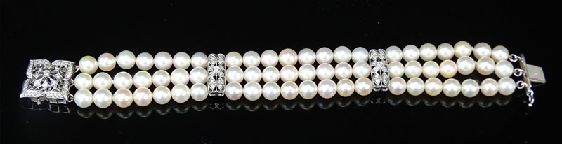 14 Karat White Gold, Diamond and Three Strand White Pearl Bracelet