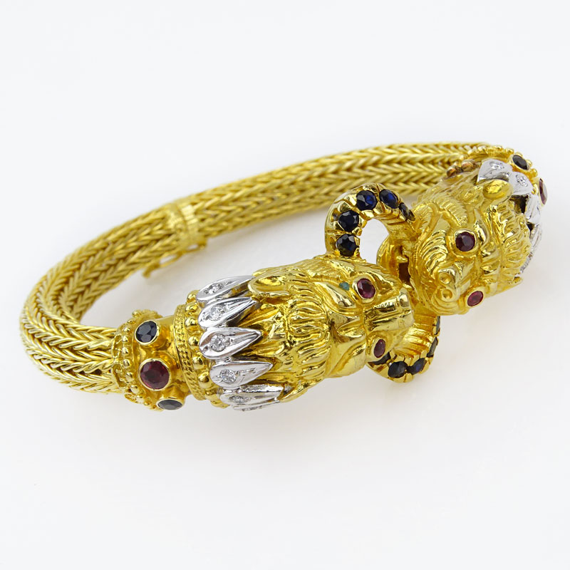 Ilias Lalaounis, Greek 18 Karat Yellow Gold Lion Head Bracelet with Diamond, Sapphire and Ruby Accents.