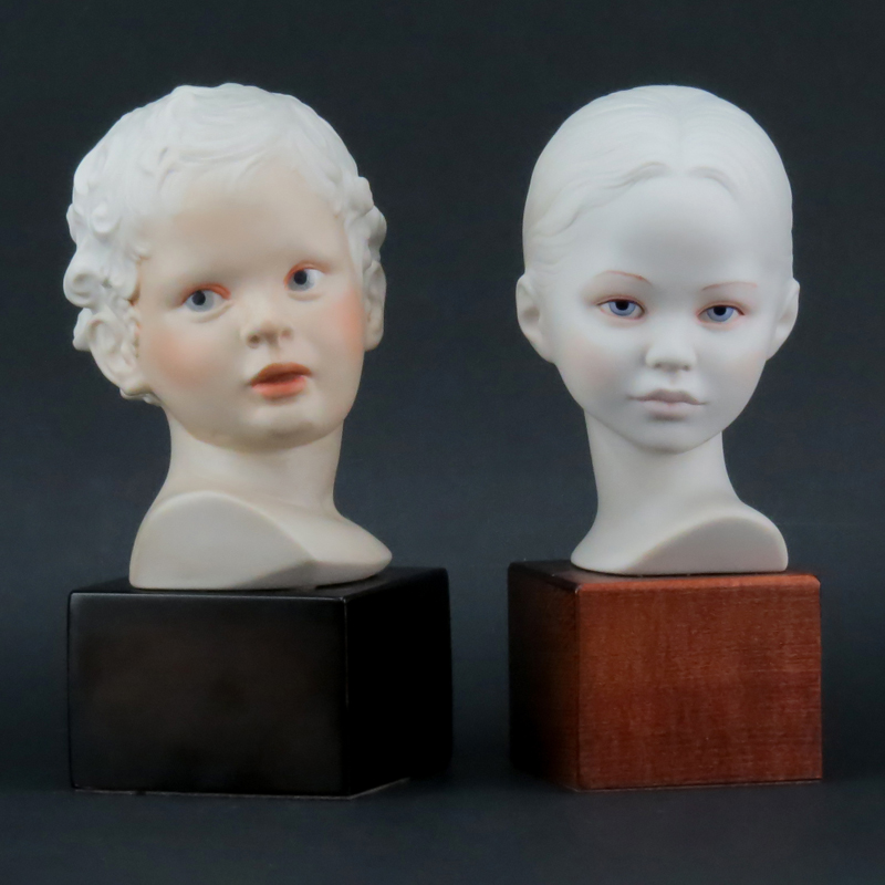 Two (2) Cybis Polychrome Porcelain Young Male and Female Busts Mounted on Wooden Bases