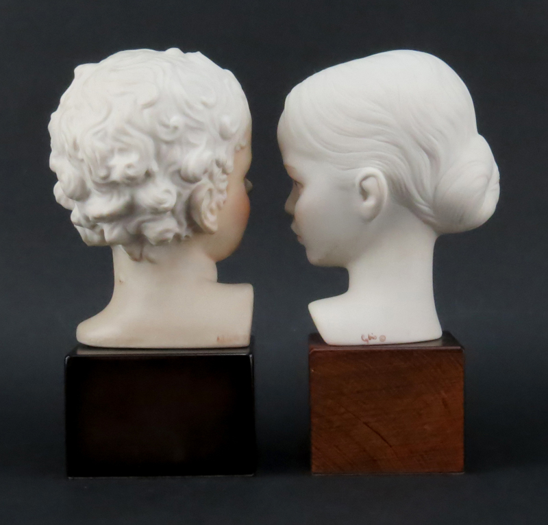 Two (2) Cybis Polychrome Porcelain Young Male and Female Busts Mounted on Wooden Bases