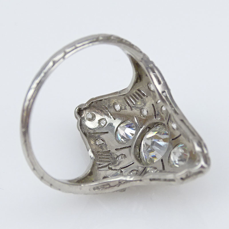 1.55 Carat Diamond and Filigree Platinum Ring set in the center with an Approx. .70 Carat Round Brilliant Cut Diamond.