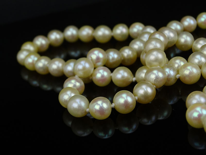 Vintage Single Strand White Pearl Necklace with 14 Karat Yellow Gold Clasp accented with Diamonds and Rubies