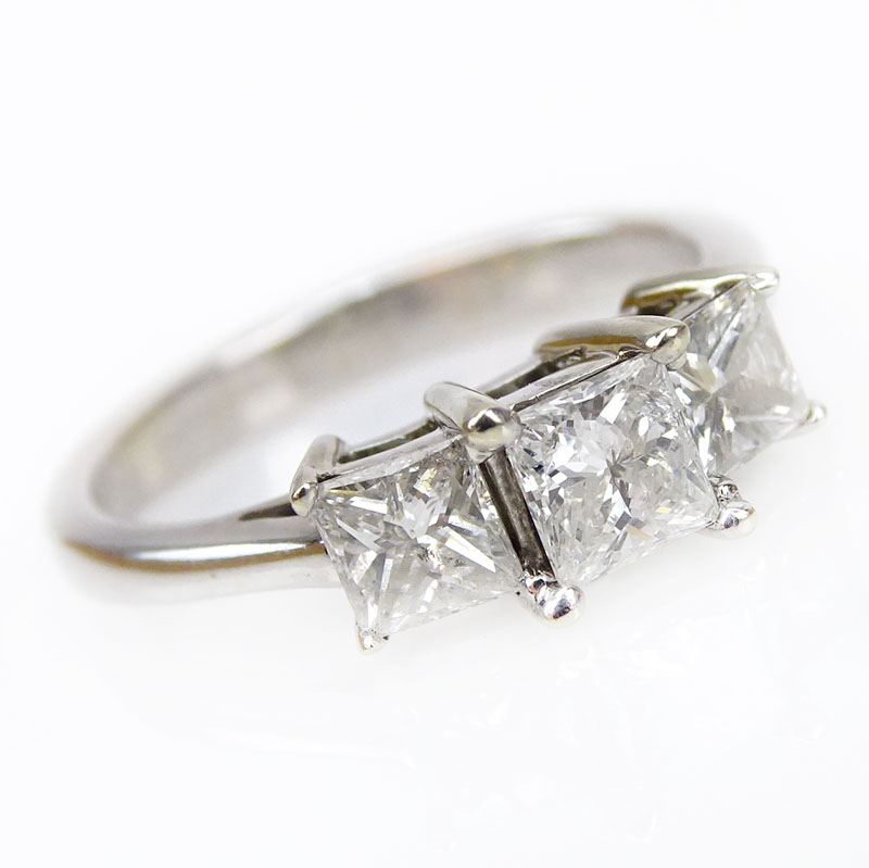 1.0 Carat TW Princess Cut Diamond and 14 Karat White Gold Three Stone Engagement Ring.