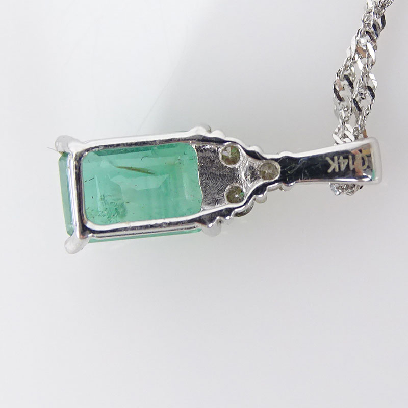 1.0 Carat Emerald, .10 Carat Diamond and 14 Karat White Gold Pendant Necklace.