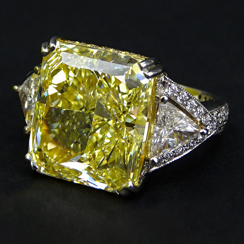 Important GIA Certified 14.32 Carat Internally Flawless Rectangular Brilliant Cut Fancy Intense Yellow Diamond and Platinum Ring.