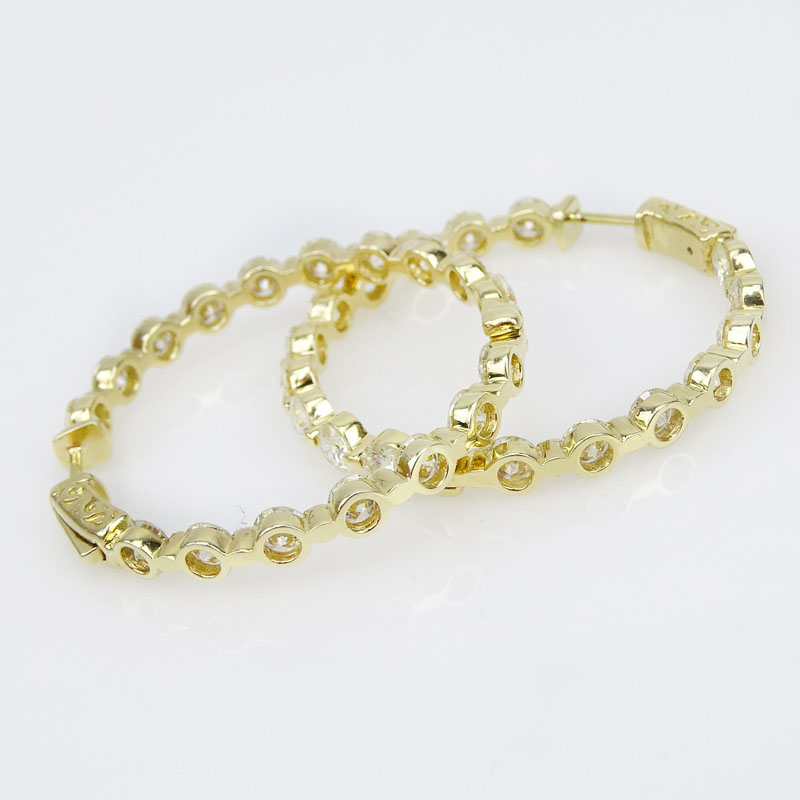 7.50 Carat Round Brilliant Cut Diamond and 14 Karat Yellow Gold In and Out Hoop Earrings.
