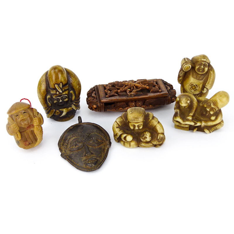 Collection of Four (4) Vintage Japanese Carved Bone Netsuke, a Carved Horn Netsuke, a Carved Horn Snuff Box and an African Iron Mask Pendant