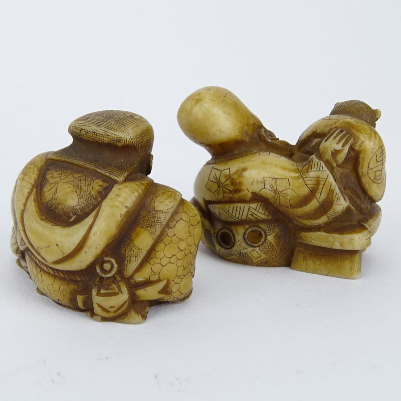 Collection of Four (4) Vintage Japanese Carved Bone Netsuke, a Carved Horn Netsuke, a Carved Horn Snuff Box and an African Iron Mask Pendant