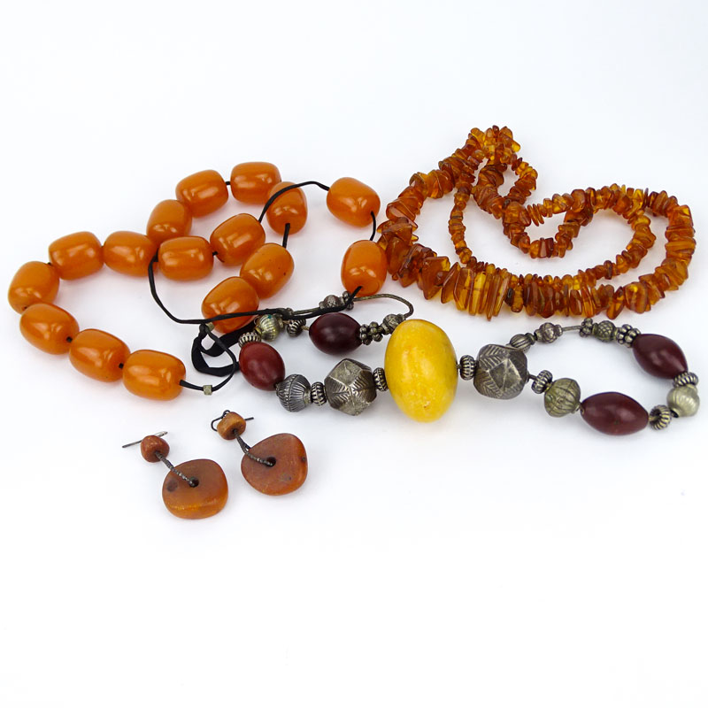 Three (3) Vintage Amber Bead Necklaces together with One Pair of Amber Earrings