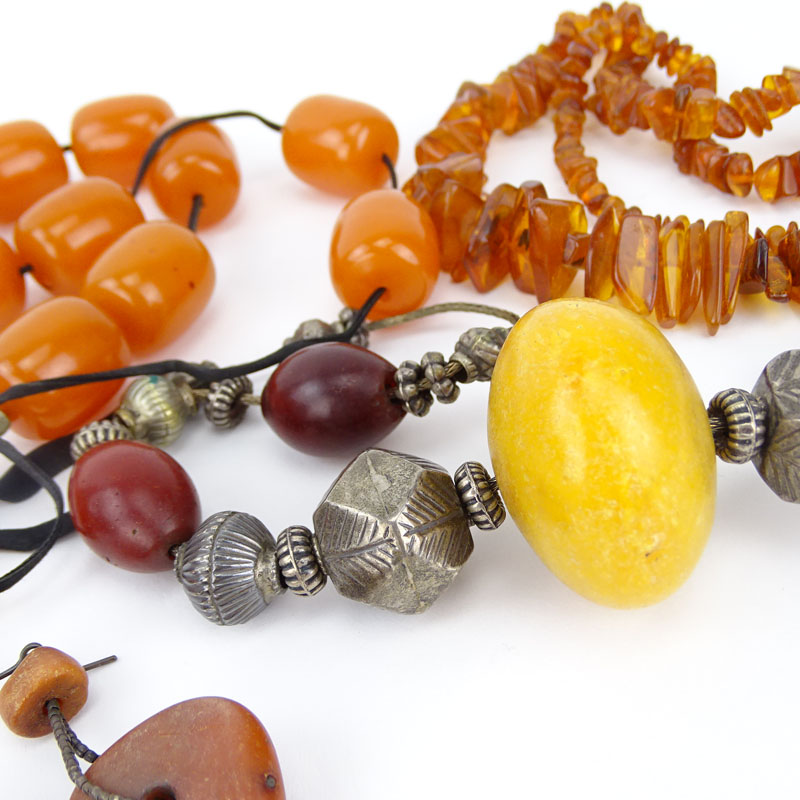 Three (3) Vintage Amber Bead Necklaces together with One Pair of Amber Earrings