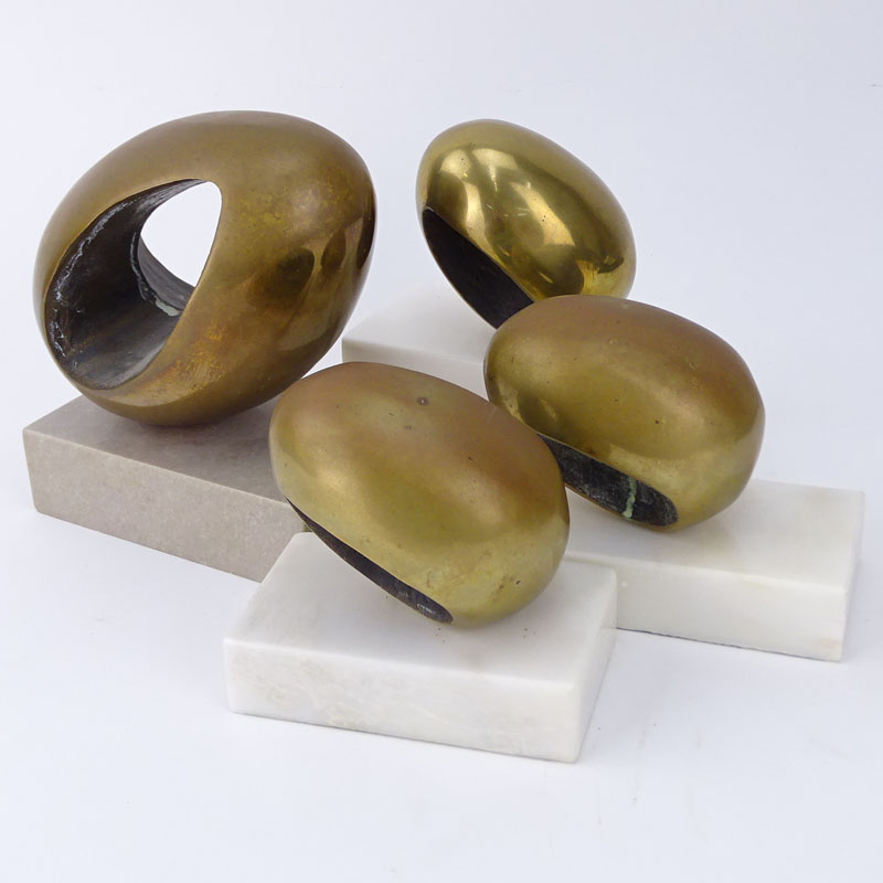 Grouping of Four (4) Modern Bronze Pierced Egg Shaped Sculptures