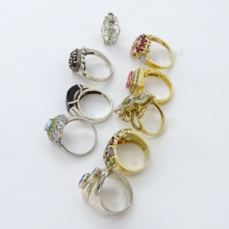 Collection of Eight (8) Sterling Silver Rings and One (1) Pendant all with Gemstones