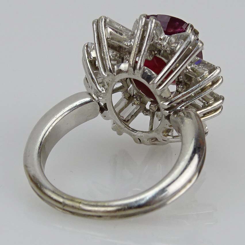 Vintage Oval Cut Ruby and Baguette Cut Diamond and Platinum Ring.