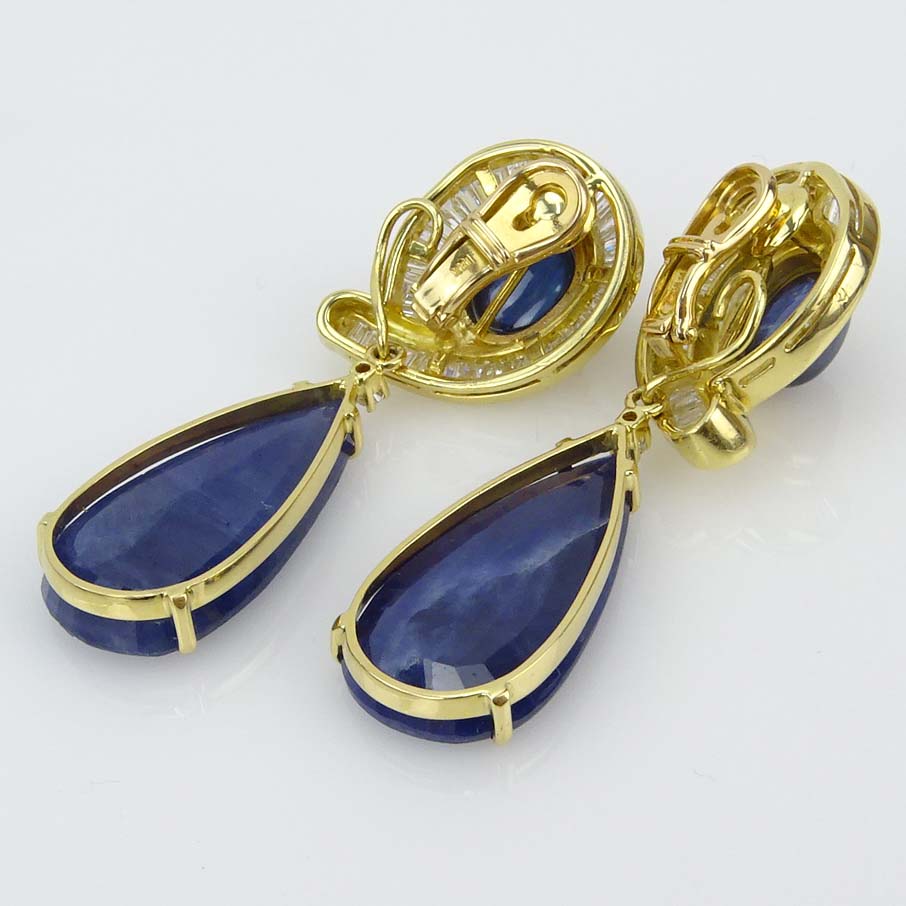 Vintage Large Pear Shape Sapphire, Cabochon Star Sapphire, Baguette Cut Diamond and 18 Karat Yellow Gold Detachable Pendant Earrings.