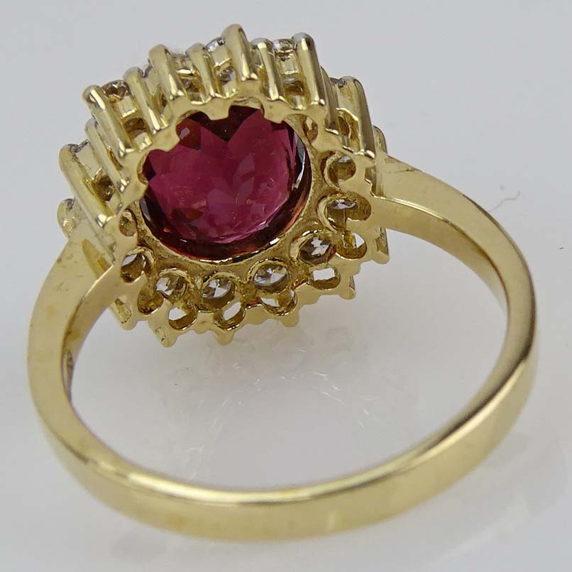 Contemporary 2.87 Carat Oval Cut Pink Tourmaline, Diamond and 9 Karat Yellow Gold Ring. 