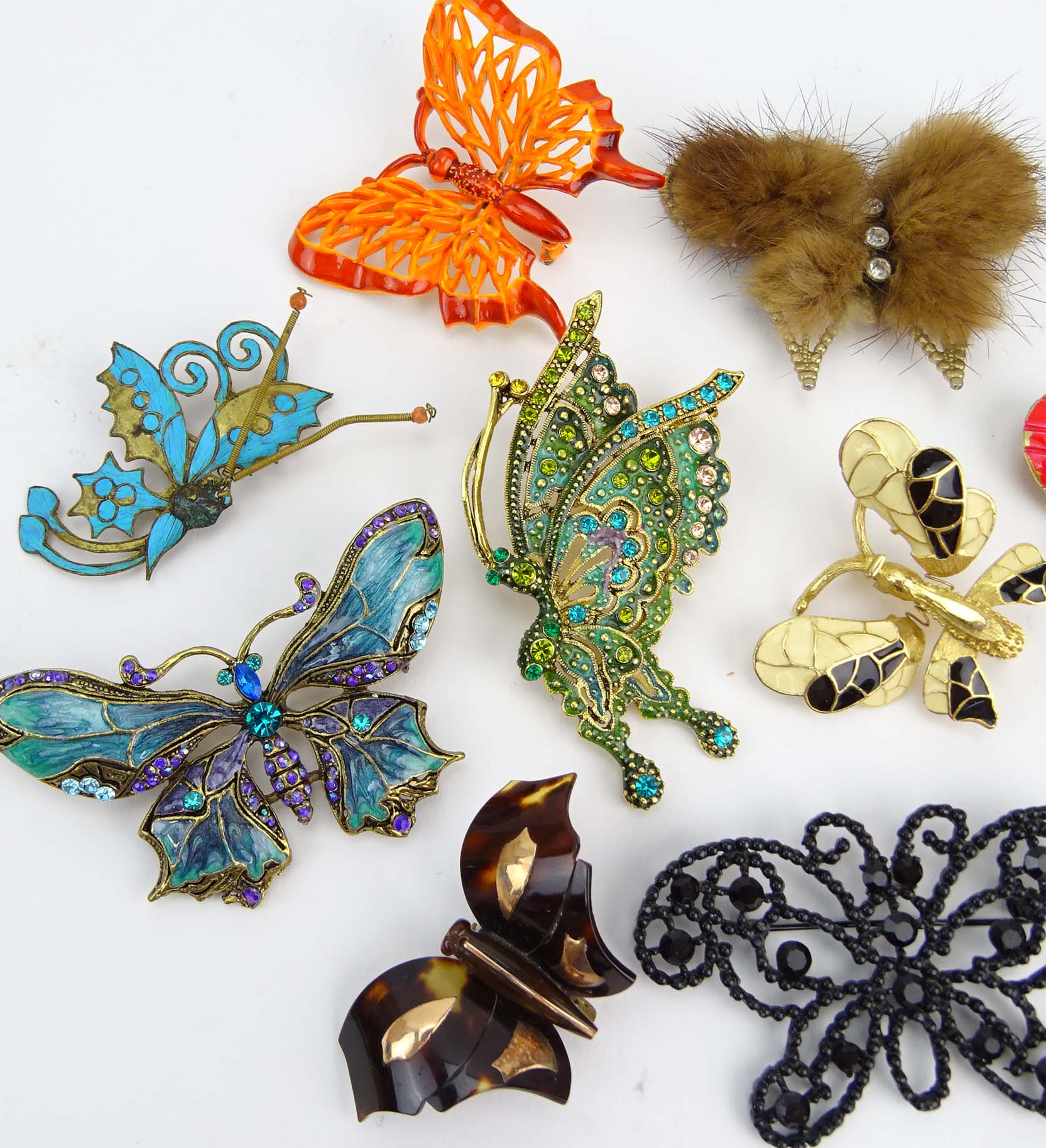 Collection of Seventeen (17) Fashion Butterfly Brooches variously with enamel and faux gem stones.