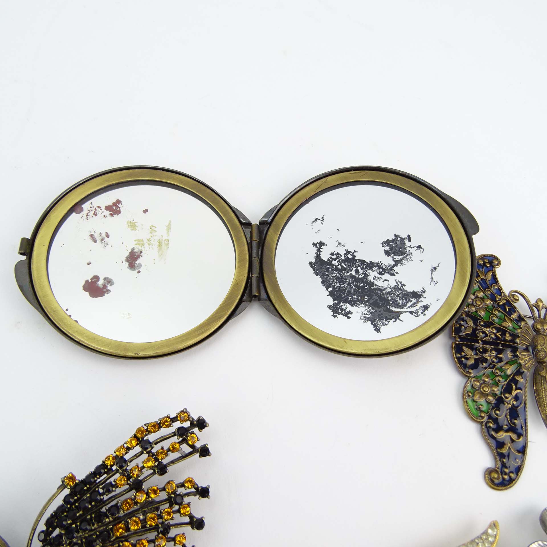 Collection of Fifteen (15) Fashion Butterfly Brooches and One (1) Compact variously with enamel and faux gem stones.