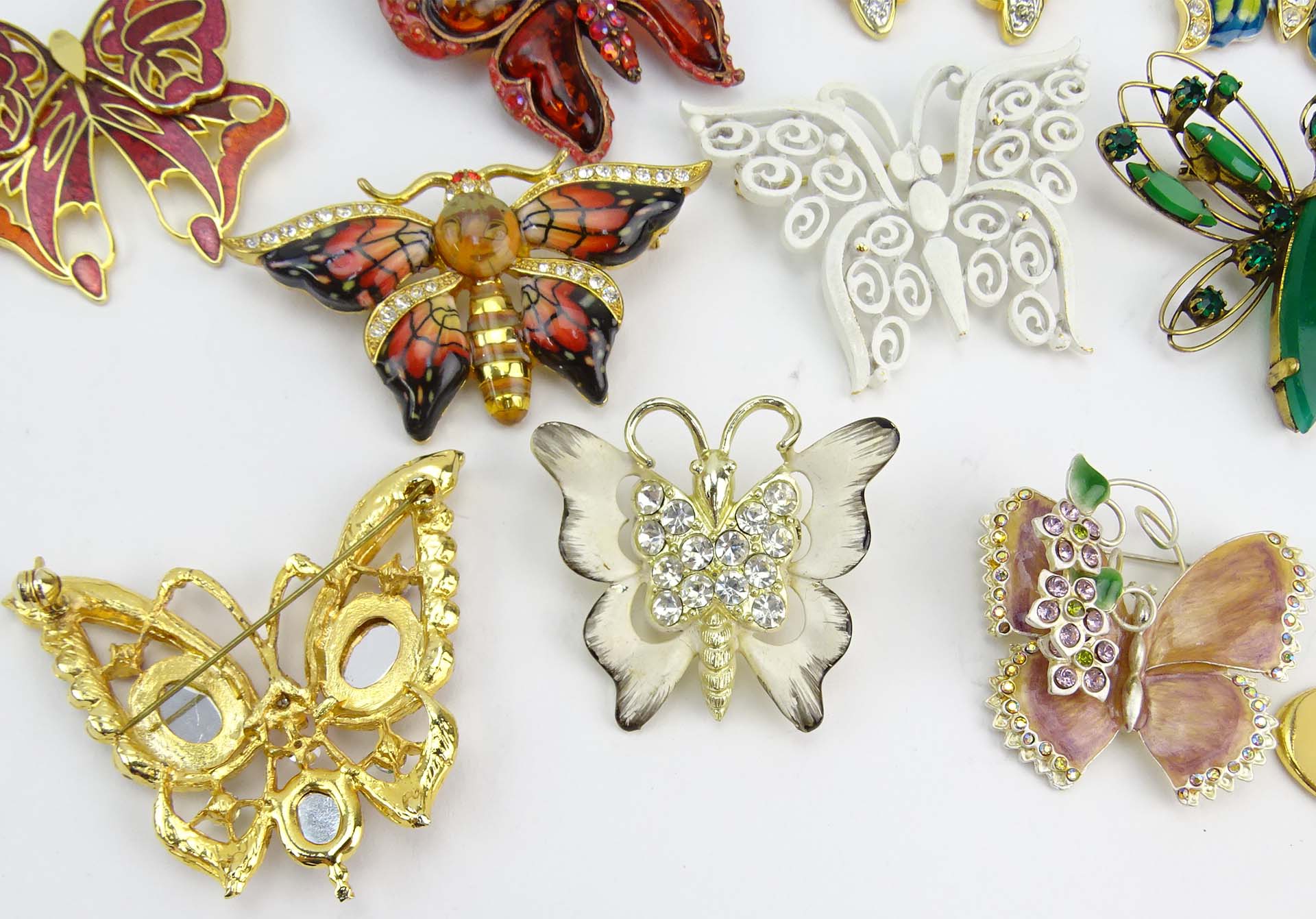 Collection of Fifteen (15) Fashion Butterfly Brooches variously with enamel and faux gem stones.