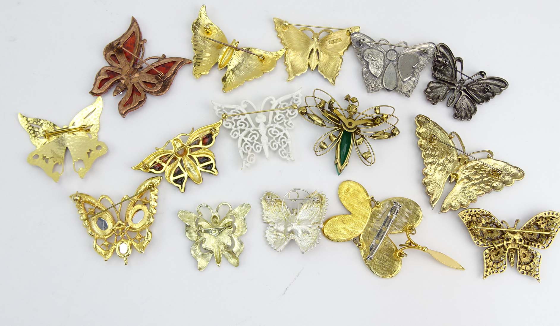 Collection of Fifteen (15) Fashion Butterfly Brooches variously with enamel and faux gem stones.