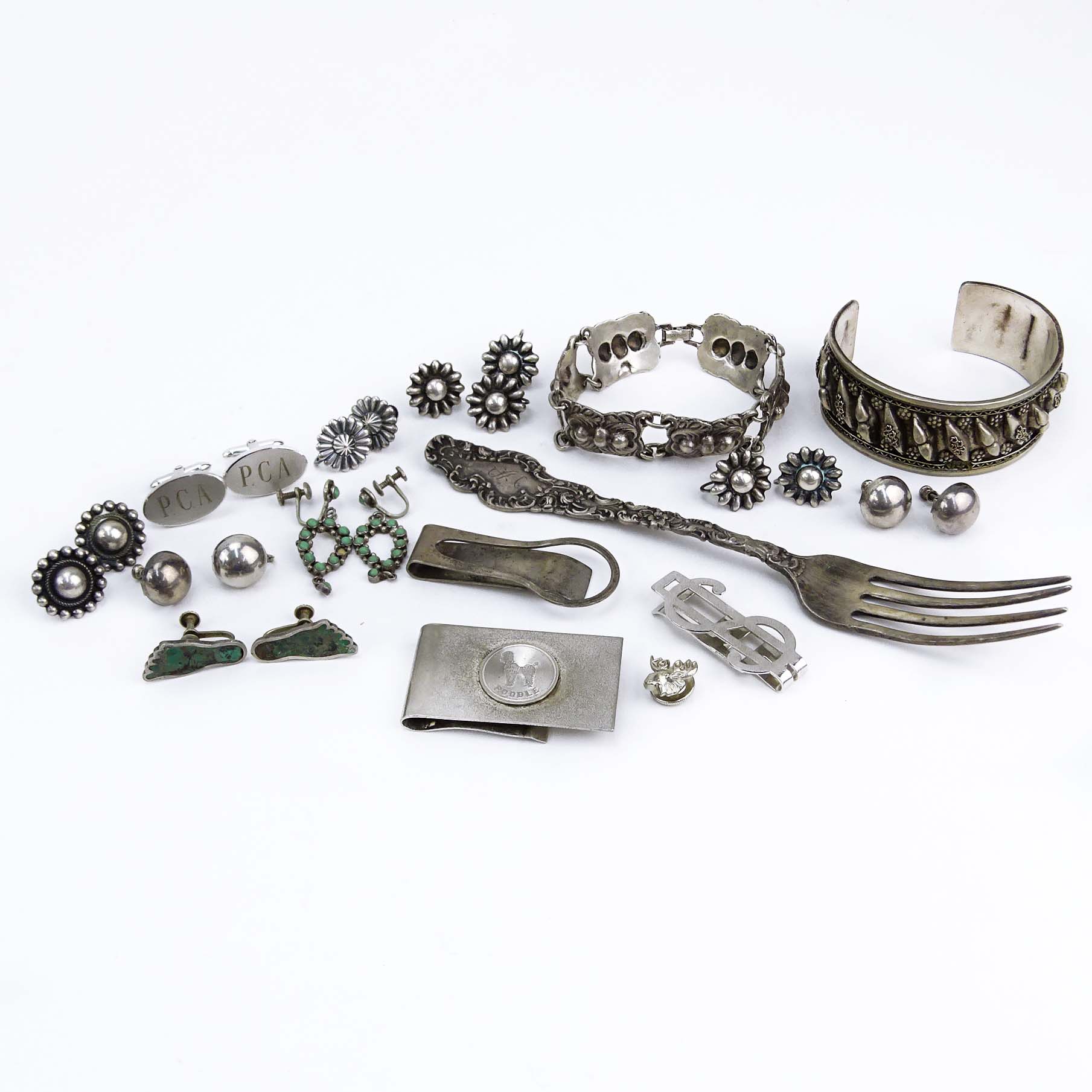 Collection of Sterling Silver Including: Three (3) Money Clips, One (1) Bracelet, Two (2) Pair of Earrings with Turquoise, One (1) Pair of Cufflinks, One (1) Tie Tack, Six pair of Button or Flower style Earrings plus One Earring and One (1) Low Grade Silv