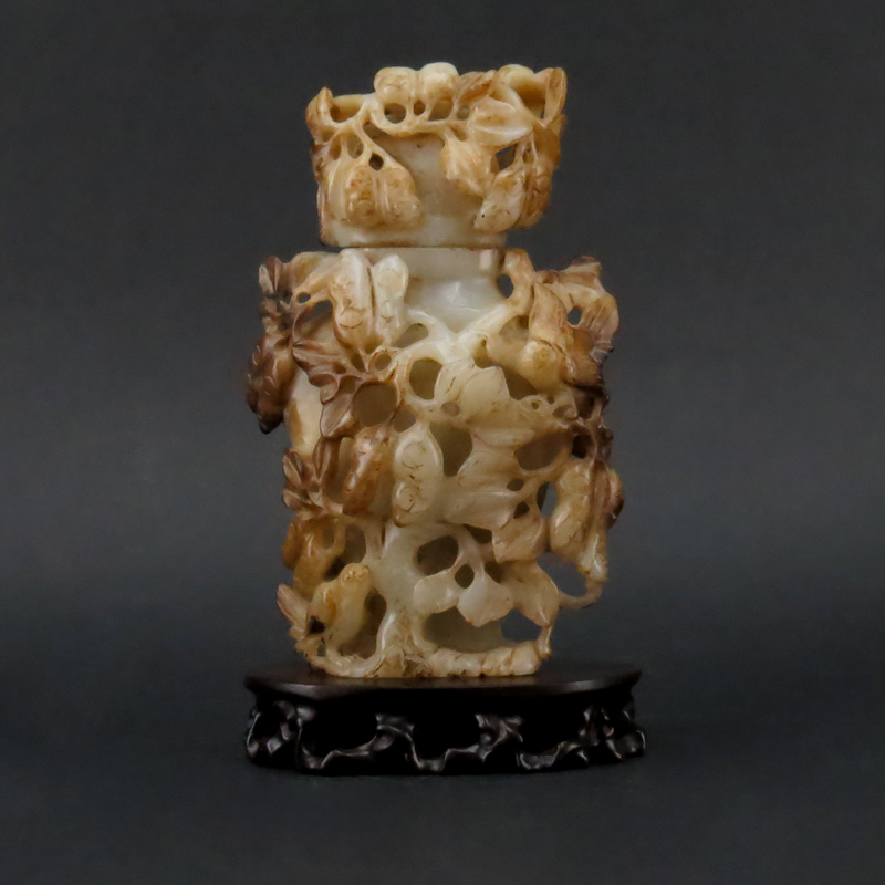 Large well carved Chinese White and Brown Jade Lidded Bottle On Stand. Birds and floral motif.