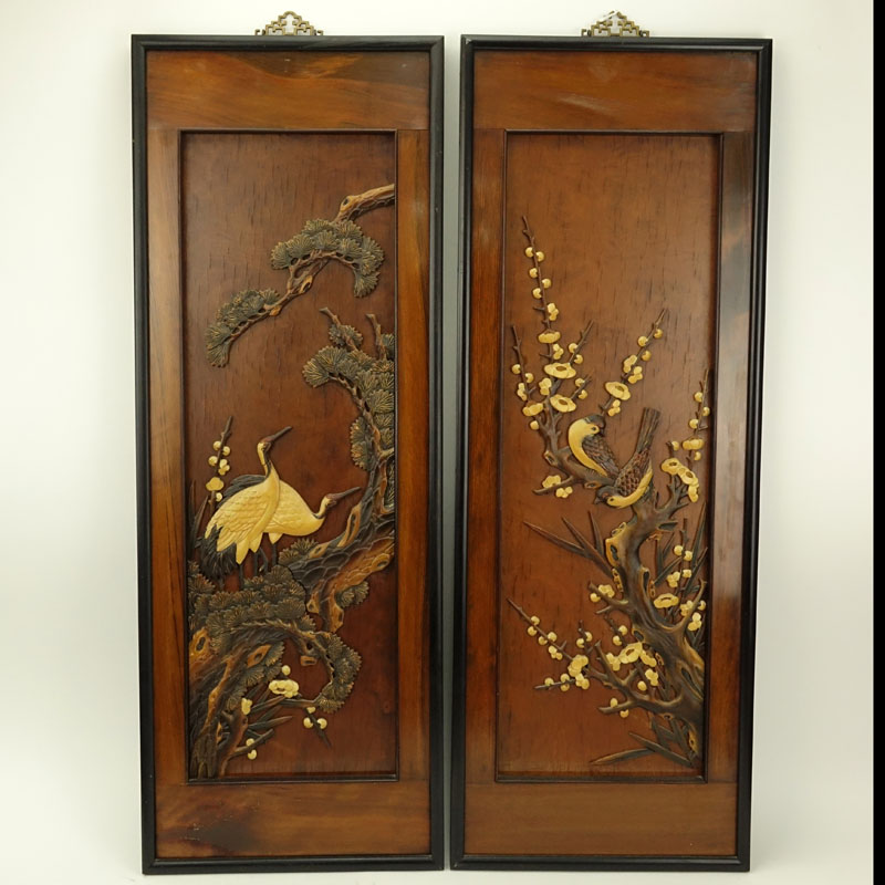 Pair of Oriental Carved Wood Wall Panels. Label marked "Made in Taiwan Republic of China" affixed en verso. 