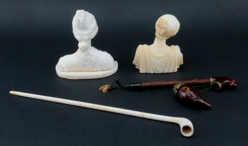Grouping of Four (4) Tableware. Includes two classical Grecian alabaster bust figures, black forest style pipe, and ceramic pipe. 