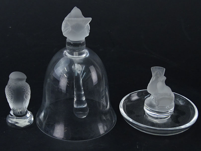 Three (3) Lalique Crystal Objects. Includes bell with bird finial, love bird ring dish, bird paperweight. 