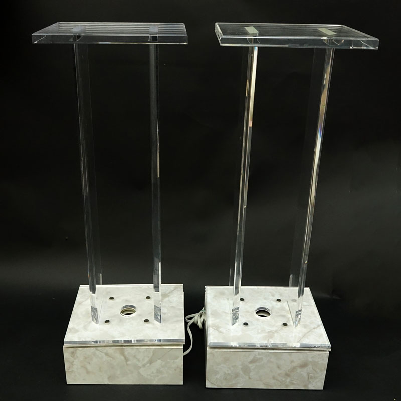 Pair of Modern Lucite and Lacquer Electrified Swivel Pedestals. Marbleized lacquer base with mounted light fixture.