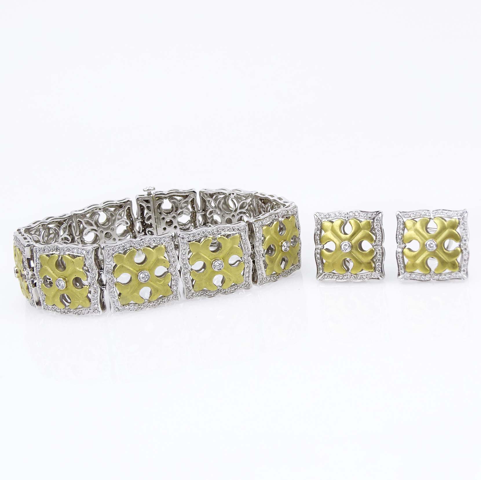 Charles Krypell 5.35 Carat Pave Set Round Brilliant Cut Diamond and 18 Karat Gold Bracelet and Earring Suite.