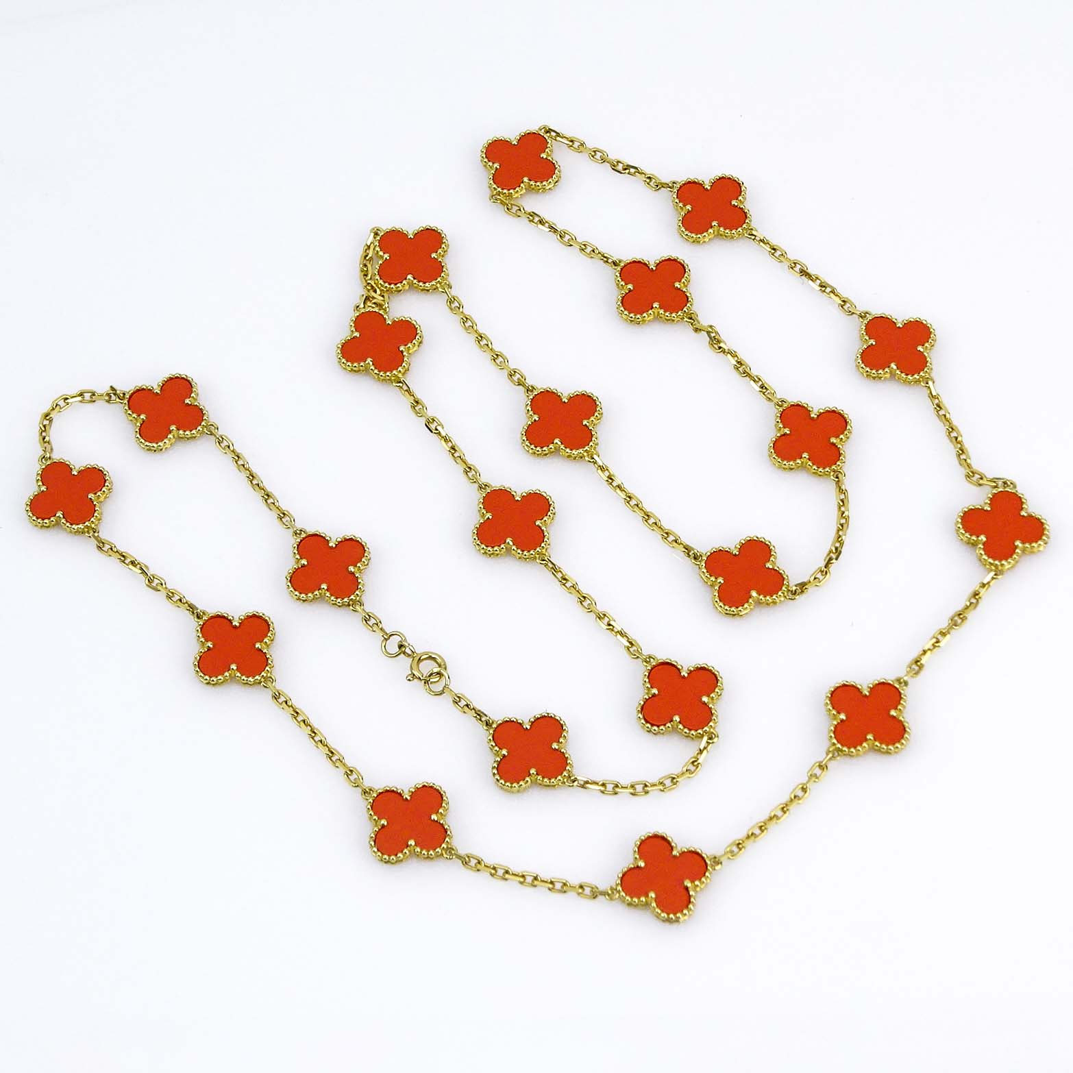 Van Cleef & Arpels 18 Karat Yellow Gold and Red Coral Alhambra Necklace with faux suede VCA case.