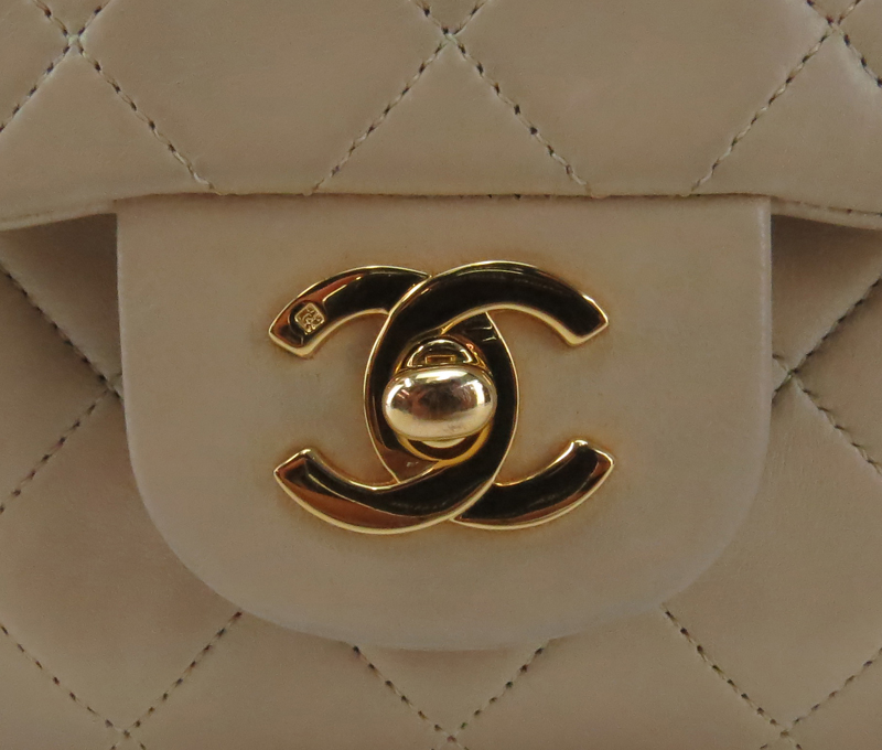 Chanel Beige Quilted Lambskin Double Flap Bag.