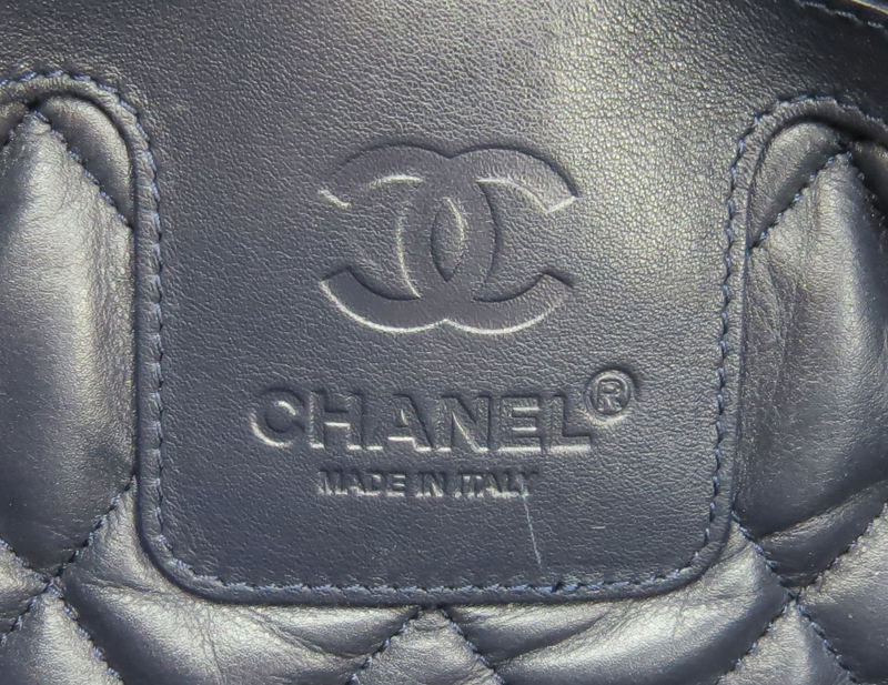 Chanel Metallic Silver-Tone Coco Cocoon Reversible Tote.