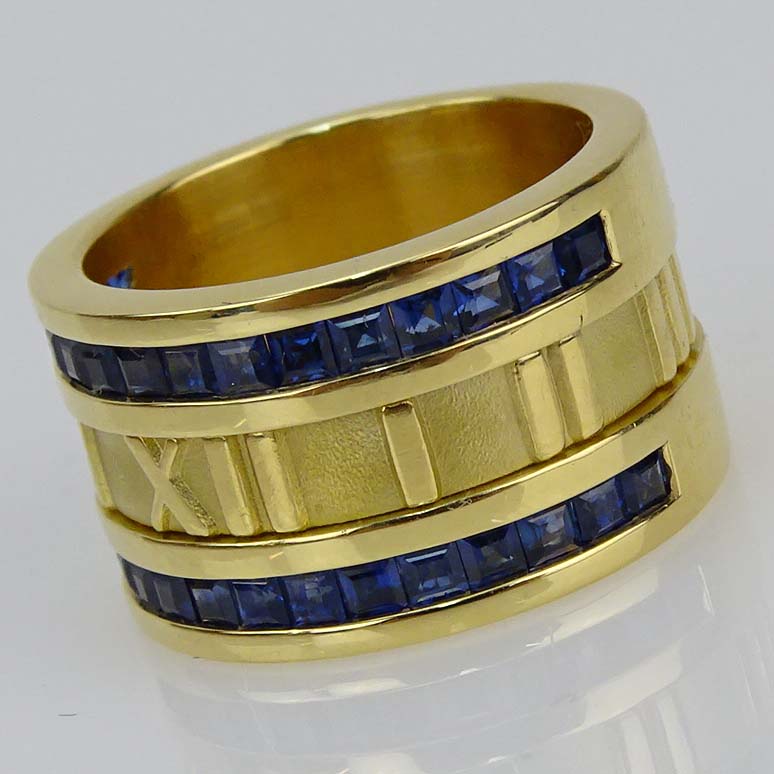 Tiffany & Co 18 Karat Yellow Gold Atlas Ring with Approx. 1.75 Carat Invisible Set Square Cut Sapphires.