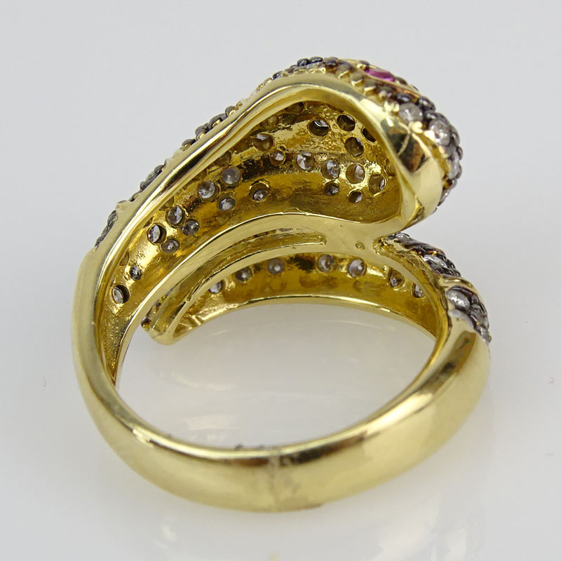 Approx. 1.20 Carat Diamond, .05 Carat Pink Sapphire and 14 Karat Yellow Gold Snake Ring. 