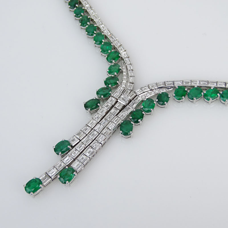 Contemporary Approx. 33.34 Carat Oval Cut Emerald, 14.02 Carat Baguette and Round Brilliant Cut Diamond and 18 Karat White Gold Necklace. 