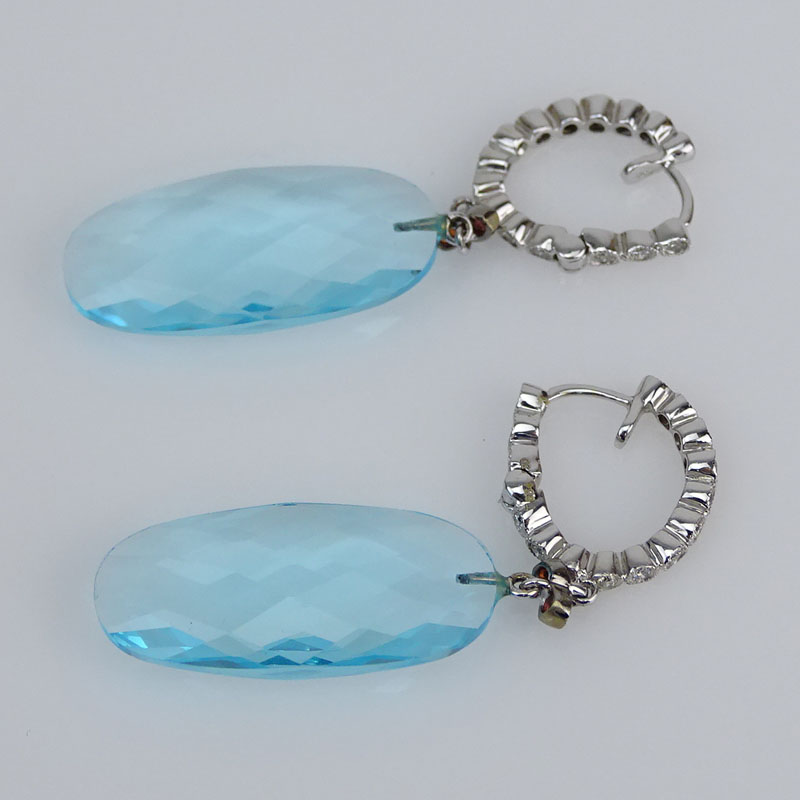 Contemporary Approx. 31.30 Carat Blue Topaz, .35 Carat Diamond and 18 Karat White Gold Pendant Earrings. 