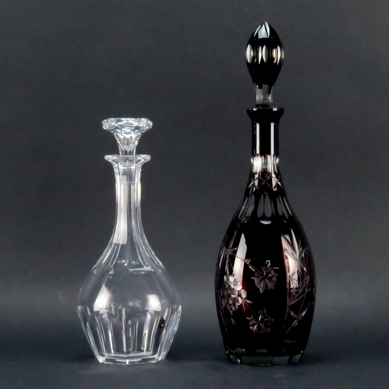 Grouping of Two (2) Vintage Decanters. Includes: Baccarat "Malmaison" decanter and Bohemian cranberry to clear decanter.