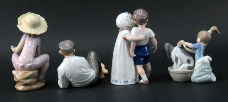 Grouping of Four (4) Porcelain Figurines.