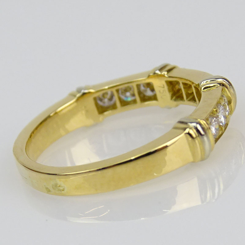 Cartier 18 Karat Yellow Gold and .27 Carat Round Brilliant Cut Diamond Contessa Ring.