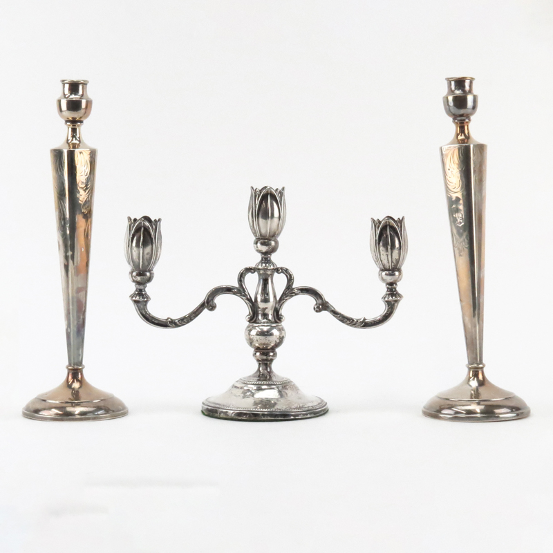 Pair of Sterling Silver Candle Sticks and A Weighted Silver 3 Arm Candelabra.