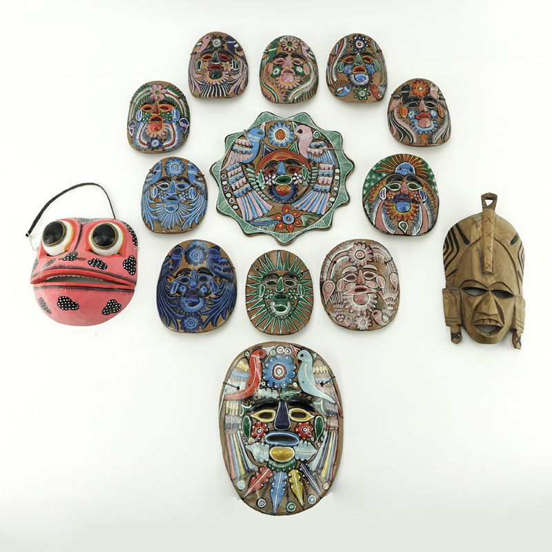 Collection of Fourteen (14) Polychrome Mexican Masks.