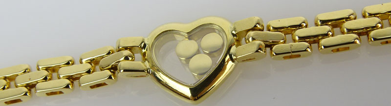 Chopard Approx. .55 Carat Round Brilliant Cut Diamond and 18 Karat White Gold Happy Diamond Heart Four Hearts Panther Link Bracelet.